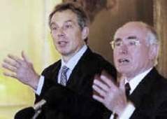 War criminals Tony Blair and John Howard