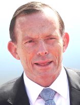 Abbott's retarded tongue affectation clearly visible