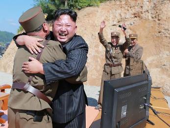 Kim Jong Un celebrating successful launch of ICBM