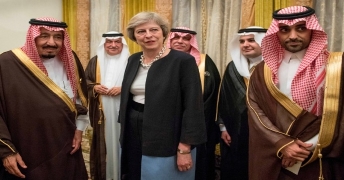 Theresa May with mass murdering, extremist, Saudi Scum