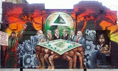 This mural reflects the Reality of elite exploitation and debt oppression placed intentionally on the global population